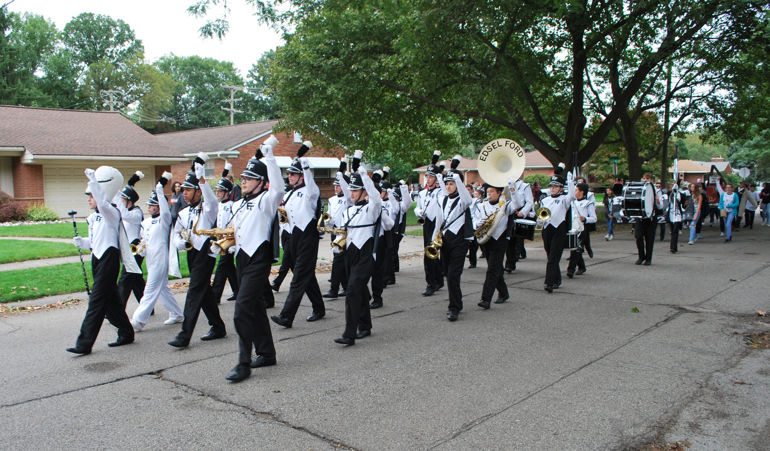 Edsel Ford High School's marching band performs in the neighborhood during the 2018 Homecoming parade.