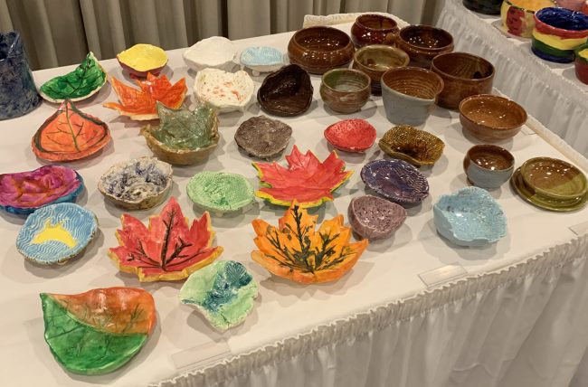 A display of some of the handmade bowls available at the 2021 Empty Bowls event.