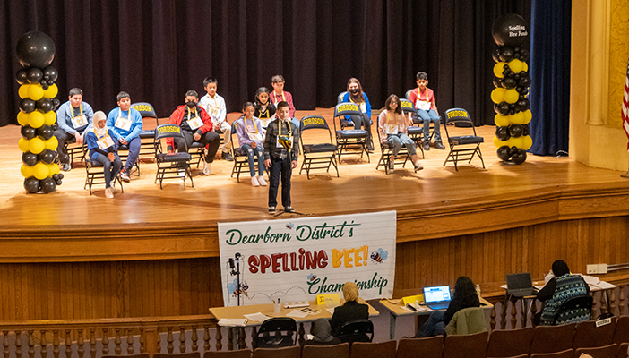 Students are on stage during the 2022 Dearborn Public Schools Spelling Bee.