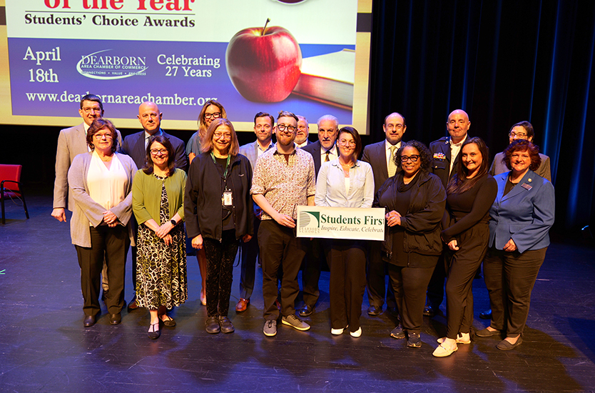 A group of dignitaries and winners pose after the 2024 Teacher of the Year ceremony