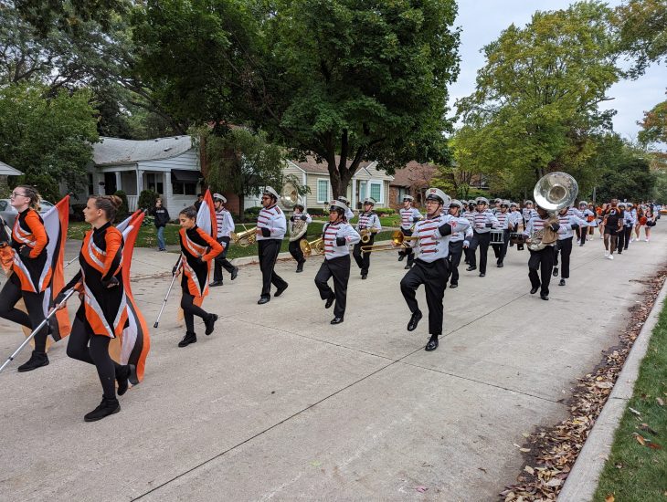 The Dearborn High Marching Band performs in the school's 2023 Homecoming parade