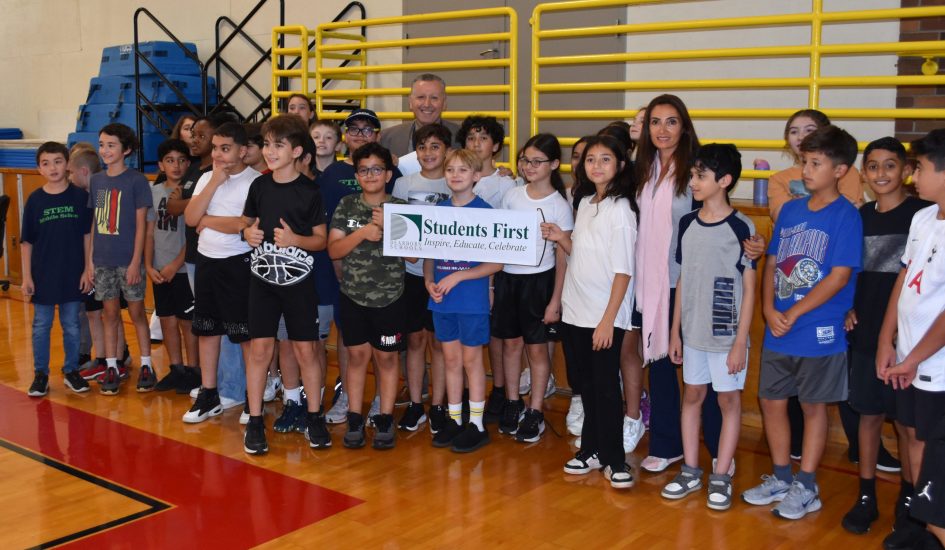 Some STEM students and administrators pose for a photo shortly after STEM was named a 2024 National Blue Ribbon School