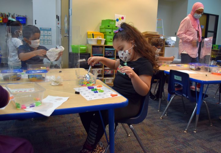 Summer School 2021 smaller A preschool student in the 2021 Summer Academic and Enrichment Program at William Ford Elementary goes "fishing" for letters to match on her sheet on June 23, 2021.